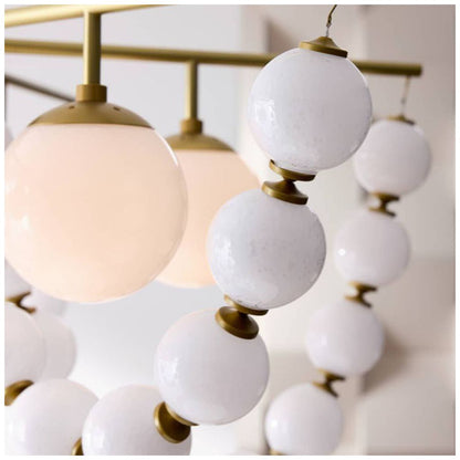 Arteriors  Genesis Chandelier 42" Opal Antique Brass